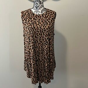 NWOT.  Woman’s round neckline swing tank with predator print pattern.